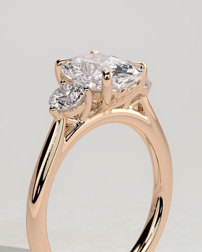 Charmaine - Elongated Cushion Claw Trilogy with Round Side Stones and Lily Detail Engagement Ring - Rose Gold