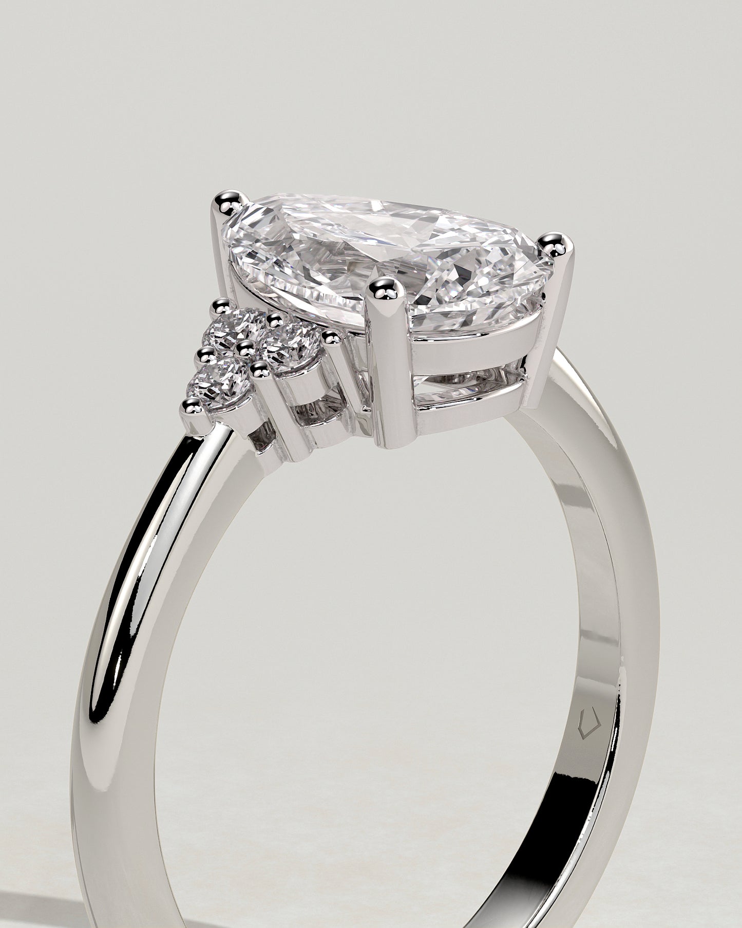 Brooke - Pear Claw Solitaire with Round Shoulder Stones Engagement Ring - Platinum - White Gold / Platinum 2ct