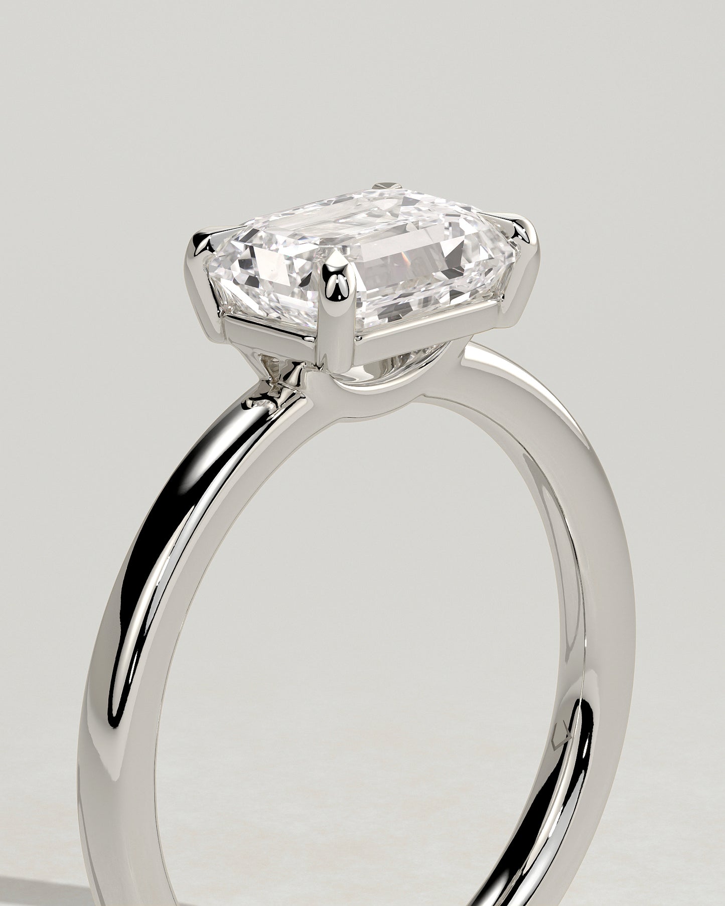 Evelyn - Emerald East West Claw Solitaire with Raised Basket Gallery Engagement Ring - Platinum - White Gold / Platinum 2ct