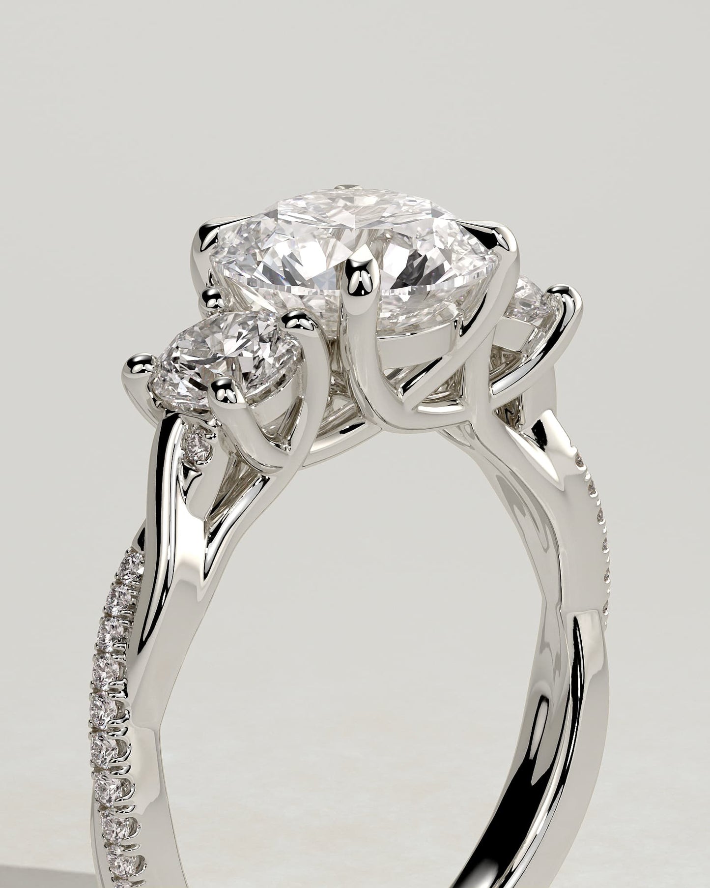 Jaylene - Round Claw Trilogy with Round Side Stones, Twisted Pave Band and Trellis Gallery Engagement Ring - White Gold