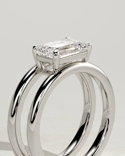 Devon - Emerald East West Claw Solitaire with Spaced Double Band Engagement Ring - Platinum
