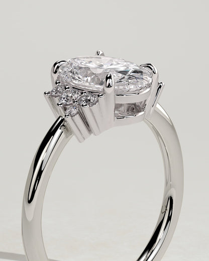 Esther - Oval Claw Solitaire with Clustered Round Opposing Shoulder Stones Engagement Ring - Platinum