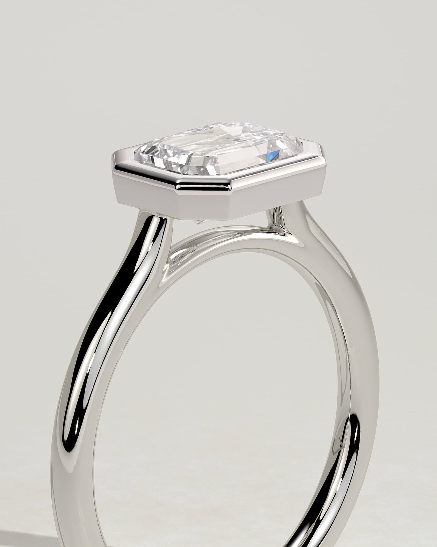 Olive - Statement Emerald East West Bezel Solitaire with Open Cathedral High Setting Engagement Ring - Platinum