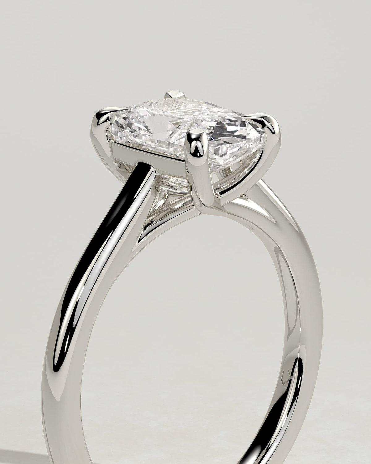 Kelsey - Elongated Cushion Claw Solitaire with Cathedral Low Setting and Open Trellis Gallery Engagement Ring - Platinum