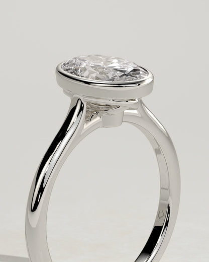 Gemma - Oval Bezel Solitaire with Twisted Gallery Engagement Ring - Platinum