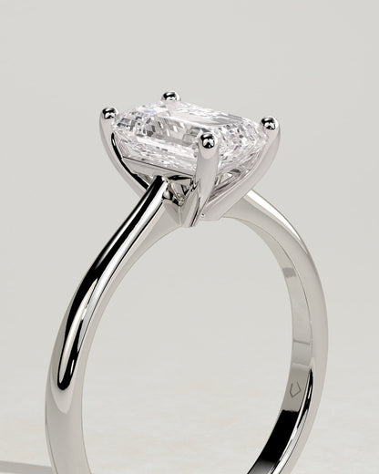 Freya - Emerald Claw Solitaire with Tapered Band and Cathedral Low Setting Engagement Ring - Platinum