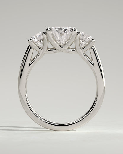 Grace - Oval Claw Trilogy with Round Side Stones, Open Trellis Gallery and Tapered Band Engagement Ring - Platinum