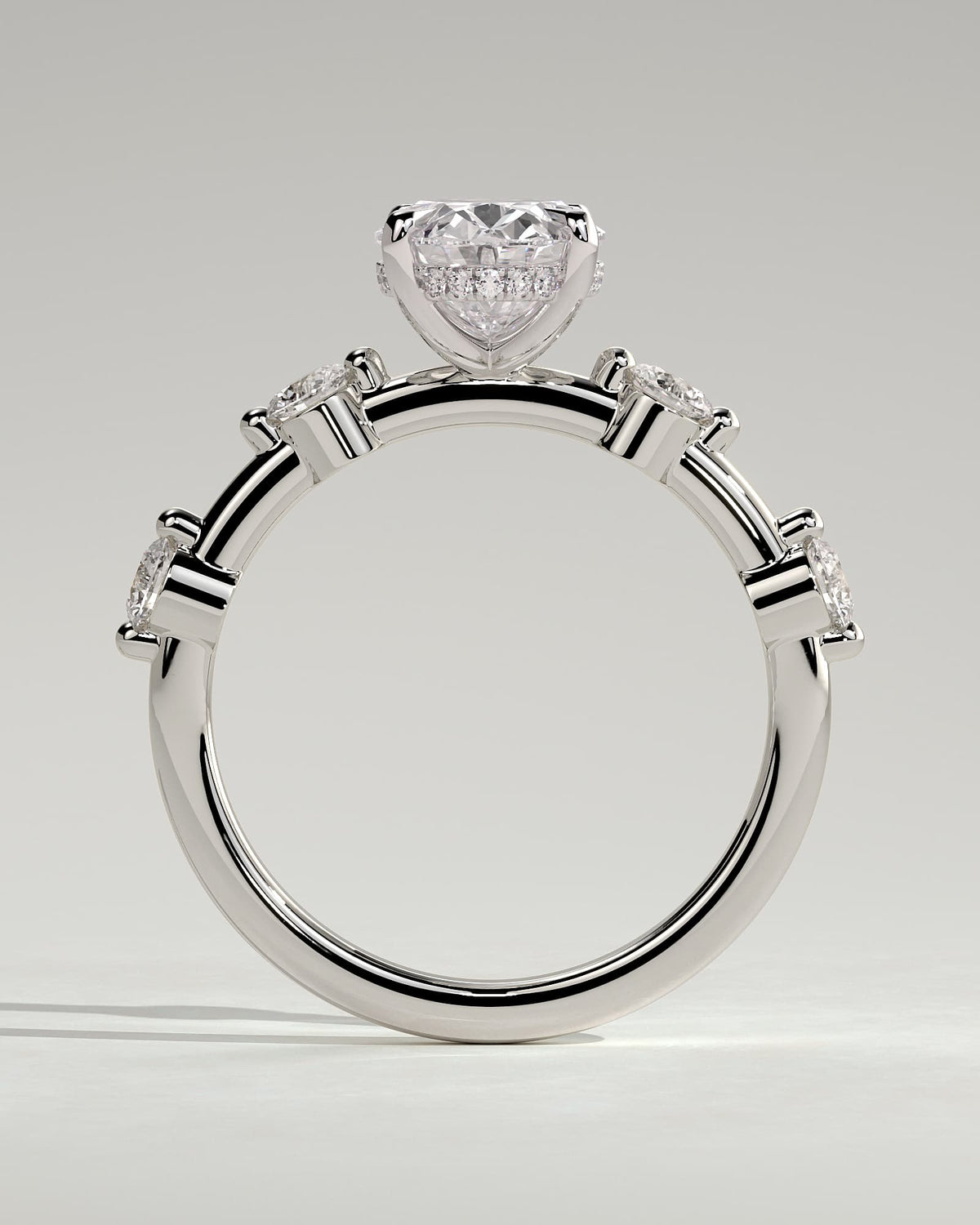 Arwen - Oval Claw Solitaire with 4 Spaced Round Accent Stones and Hidden Halo Engagement Ring - White Gold