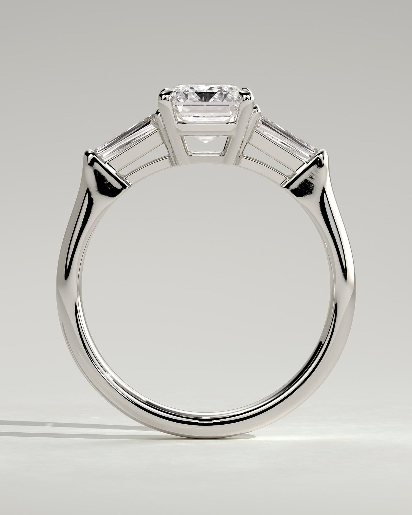 Bridget - Emerald Claw Trilogy with Tapered Baguette Side Stones and Cathedral Setting Engagement Ring - White Gold
