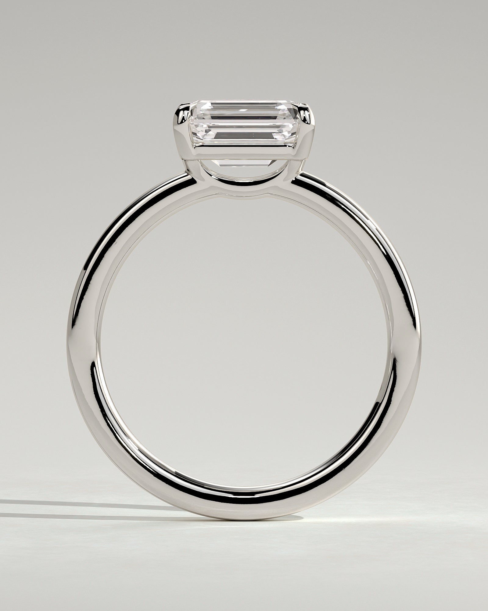 Evelyn - Emerald East West Claw Solitaire with Raised Basket Gallery Engagement Ring - Platinum - White Gold / Platinum 2ct