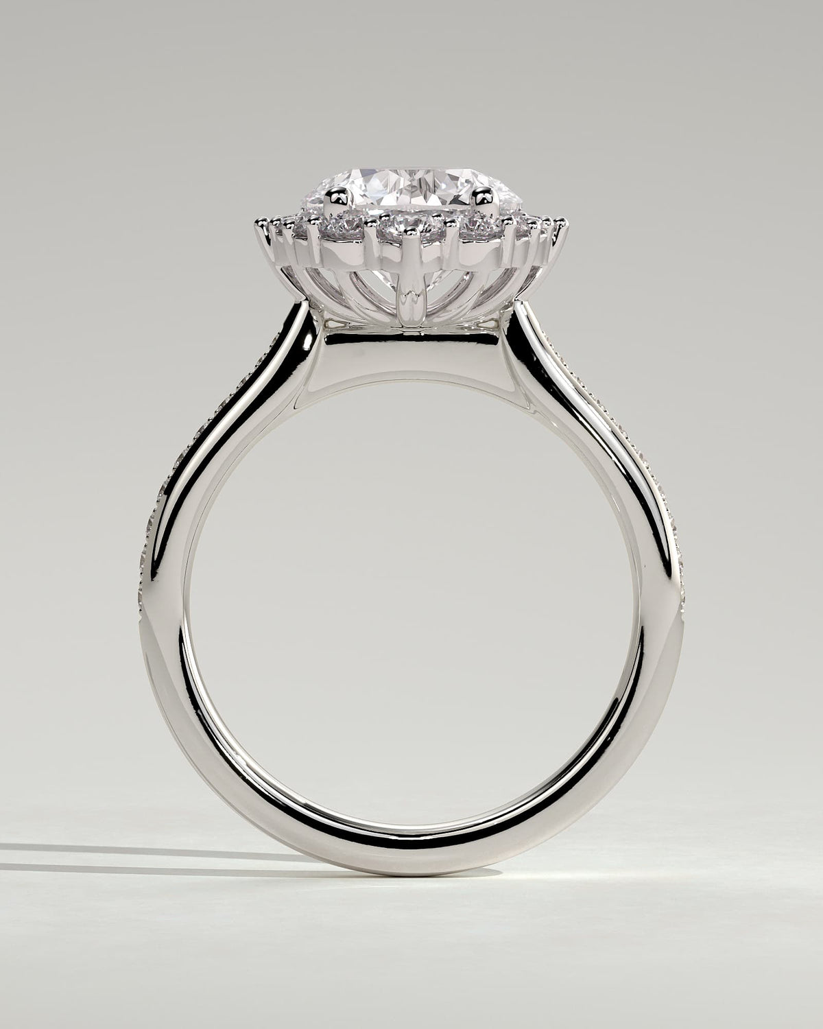 Jessica - Round Claw Solitaire with Graduating Halo and Bead Set Micropave and Tapered Band Engagement Ring - Platinum
