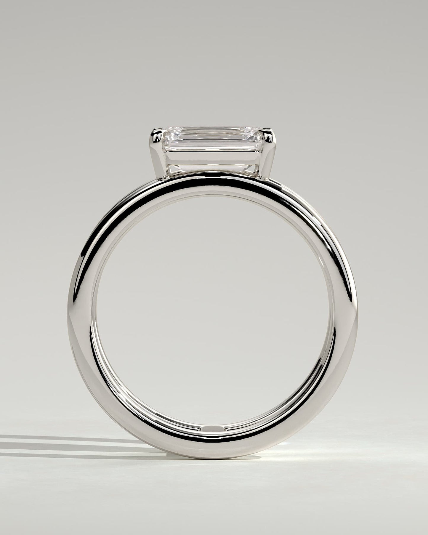 Devon - Emerald East West Claw Solitaire with Spaced Double Band Engagement Ring - White Gold