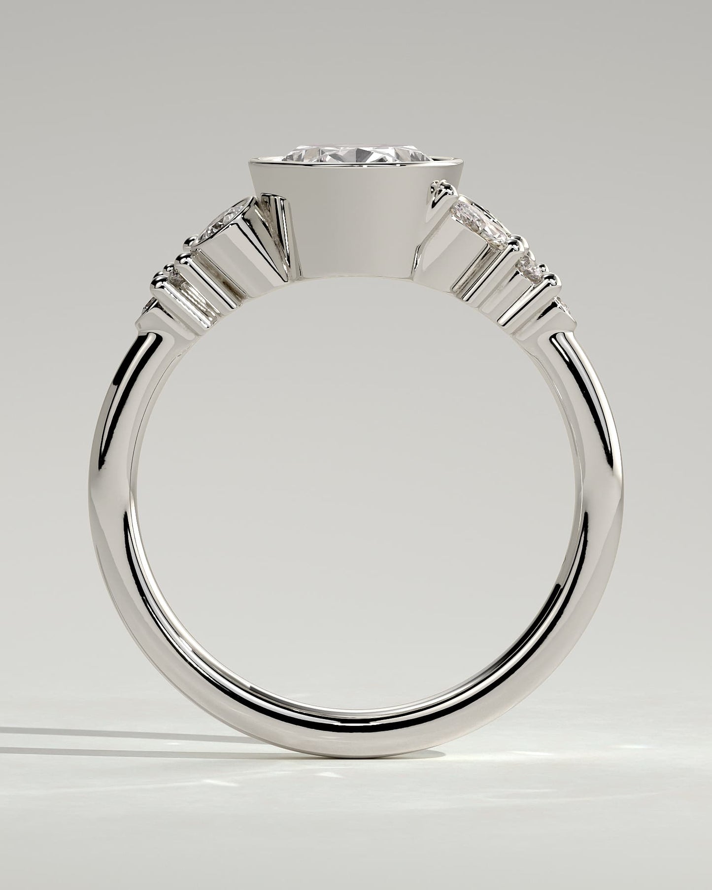 Isabella - Oval Bezel Solitaire with Clustered Round-Marquise Mixed Set Shoulder Stones Engagement Ring - White Gold