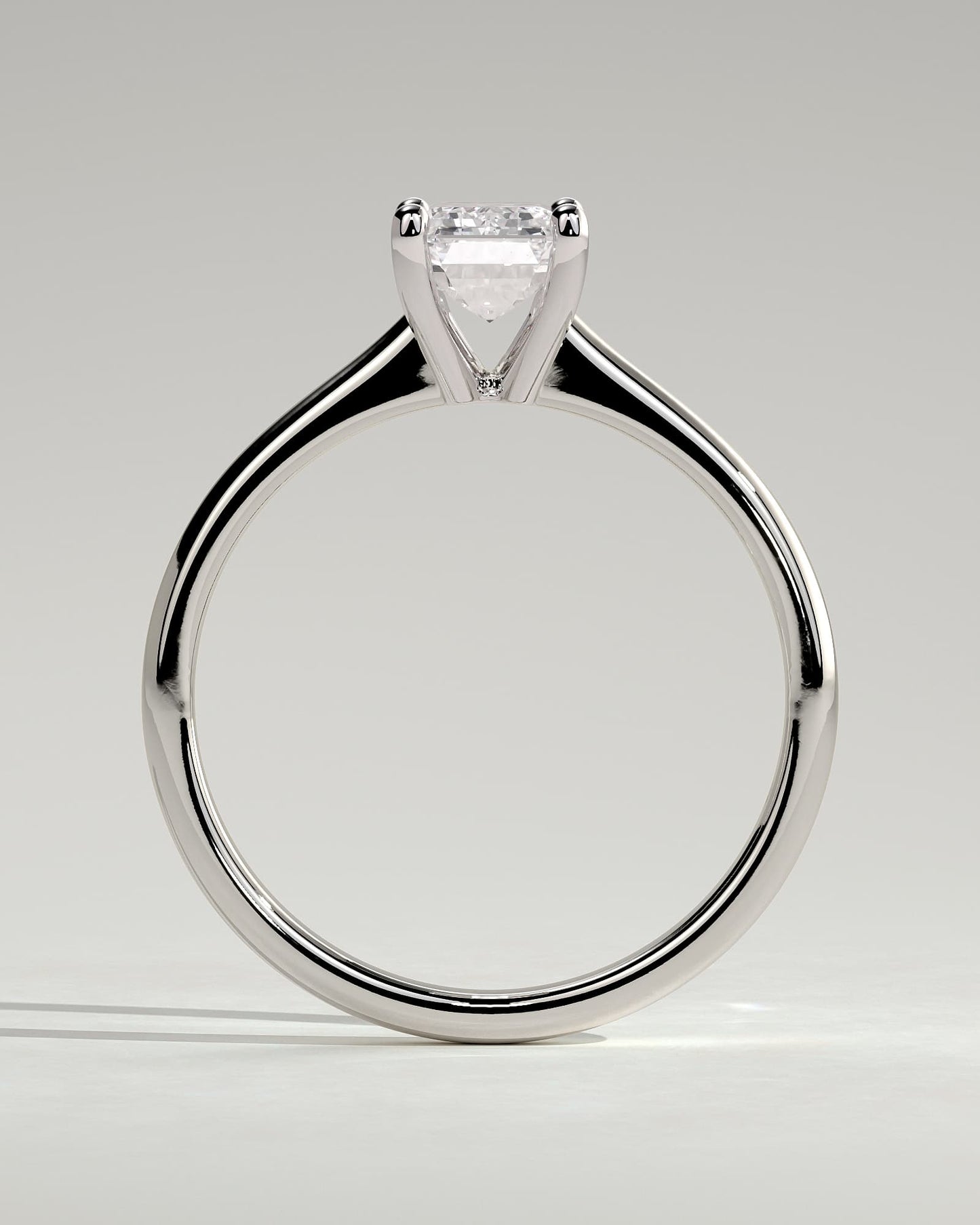 Freya - Emerald Claw Solitaire with Tapered Band and Cathedral Low Setting Engagement Ring - White Gold