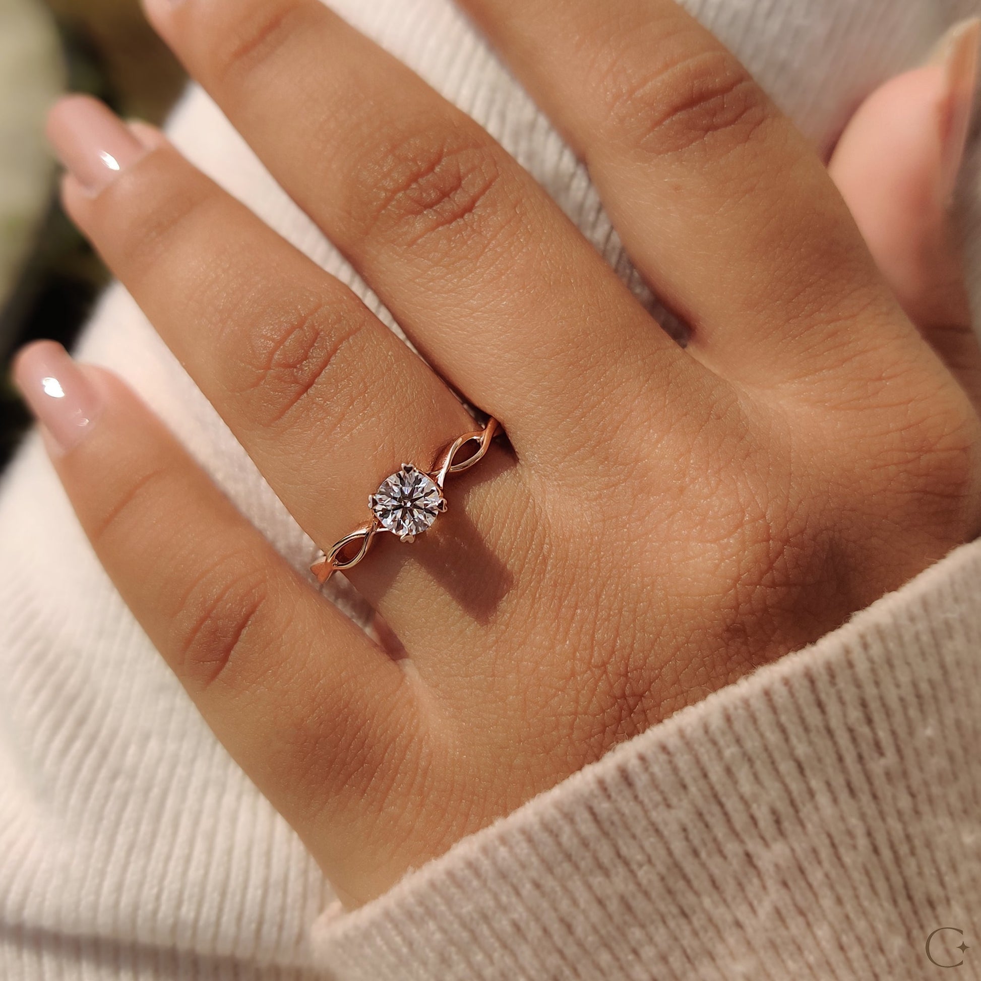 Round Solitaire Engagement Ring With Twisted Shank Band