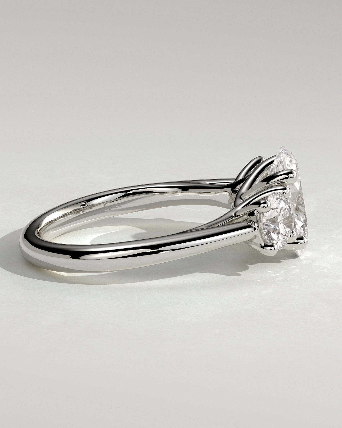 Grace - Oval Claw Trilogy with Round Side Stones, Open Trellis Gallery and Tapered Band Engagement Ring - Platinum - White Gold / Platinum 2ct