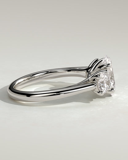 Grace - Oval Claw Trilogy with Round Side Stones, Open Trellis Gallery and Tapered Band Engagement Ring - Platinum