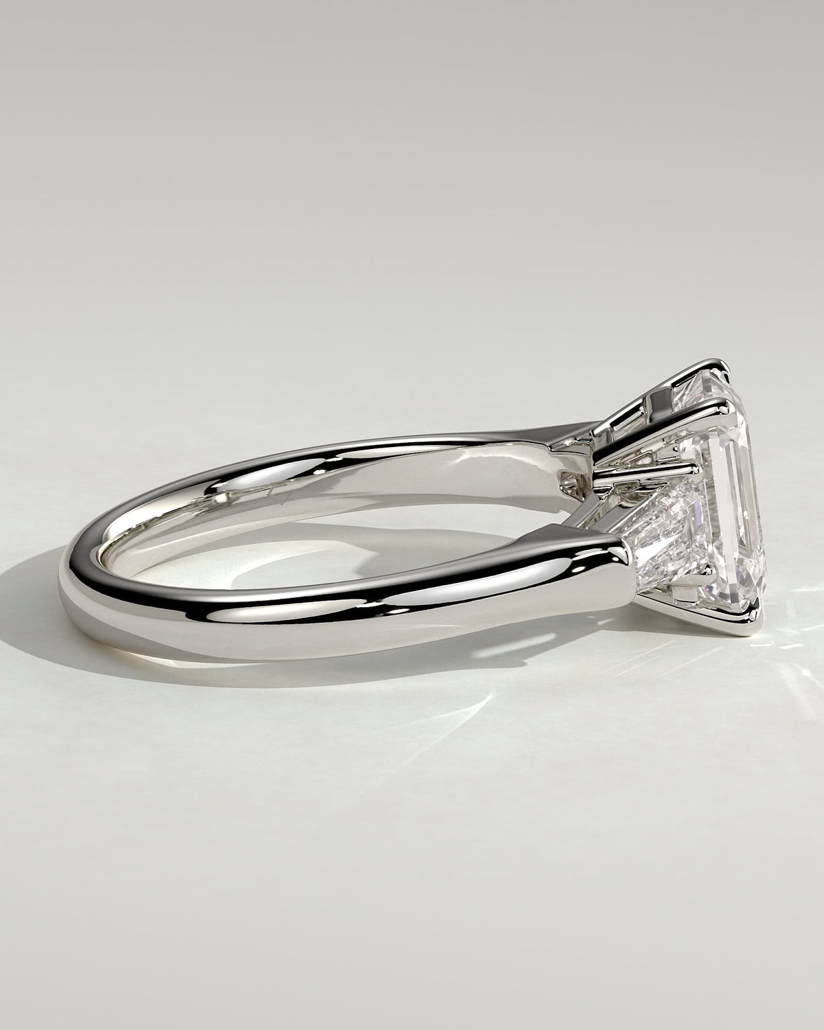 Bridget - Emerald Claw Trilogy with Tapered Baguette Side Stones and Cathedral Setting Engagement Ring - White Gold