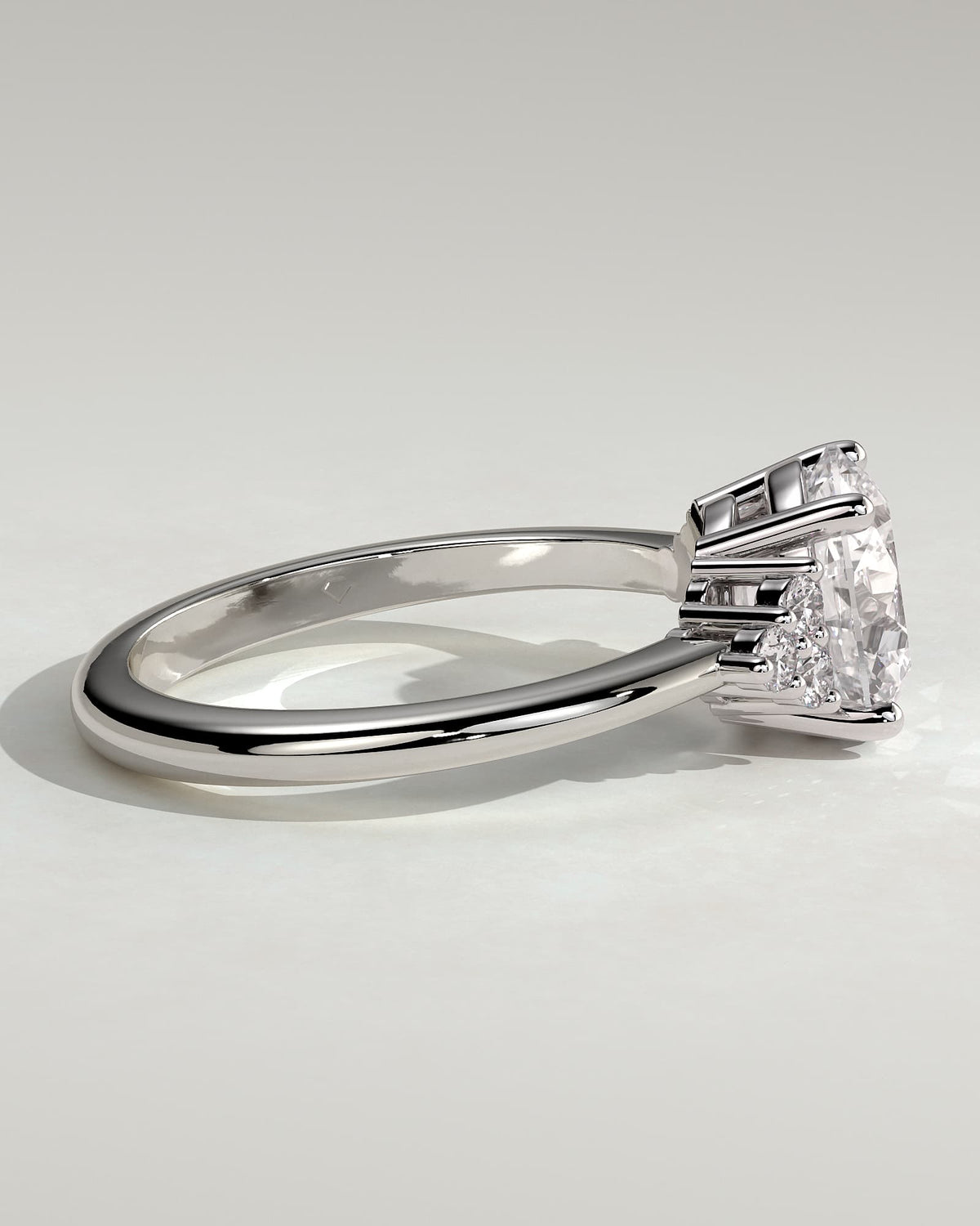 Greta - Round Claw Solitaire with Round Shoulder Stones Engagement Ring - White Gold