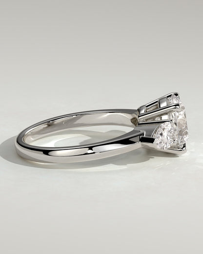 Halle - Round Claw Trilogy with Pear Side Stones and Knife Edge Band Engagement Ring - White Gold