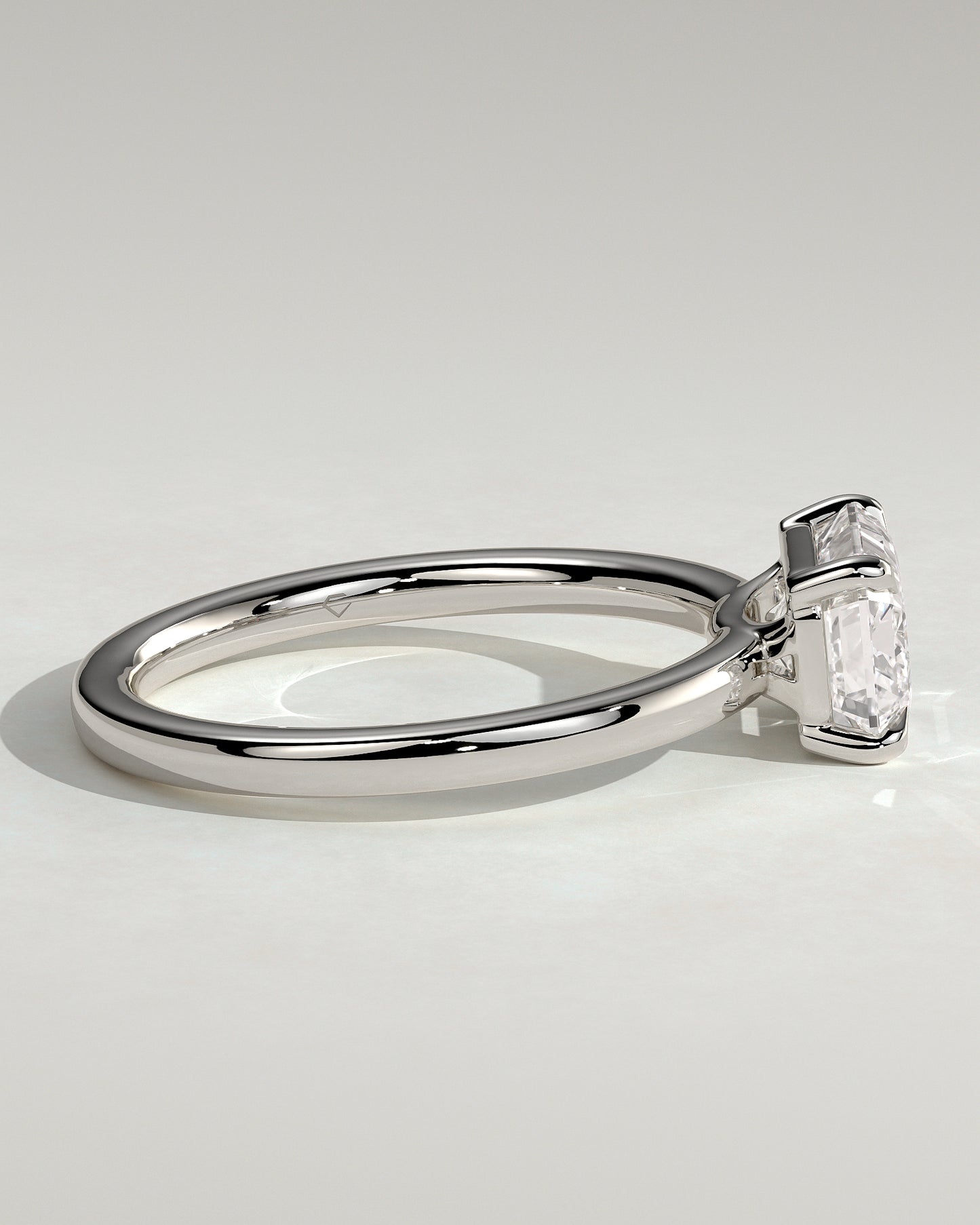 Evelyn - Emerald East West Claw Solitaire with Raised Basket Gallery Engagement Ring - Platinum - White Gold / Platinum 2ct