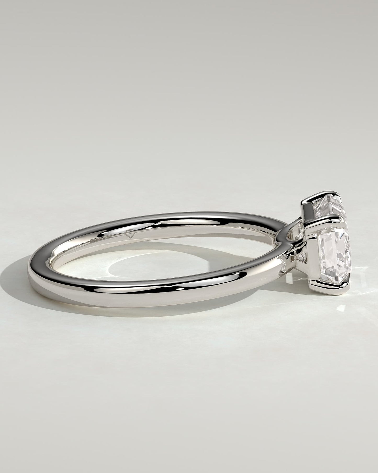 Evelyn - Emerald East West Claw Solitaire with Raised Basket Gallery Engagement Ring - White Gold
