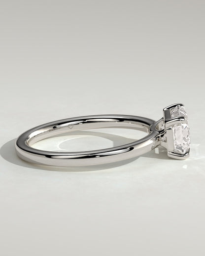 Evelyn - Emerald East West Claw Solitaire with Raised Basket Gallery Engagement Ring - White Gold