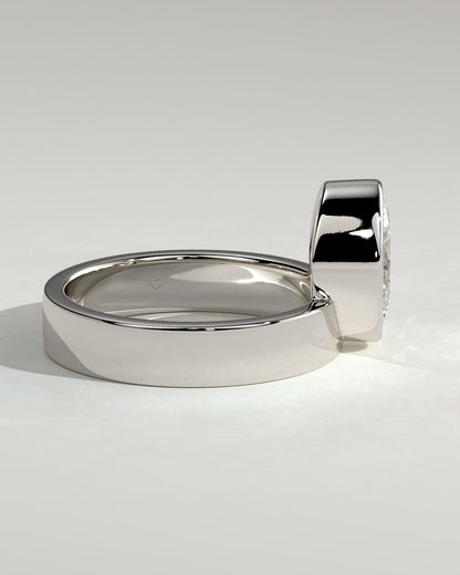 Carmen - Oval Bezel Solitaire with Offset Setting and Flat Cigar Band Engagement Ring - White Gold