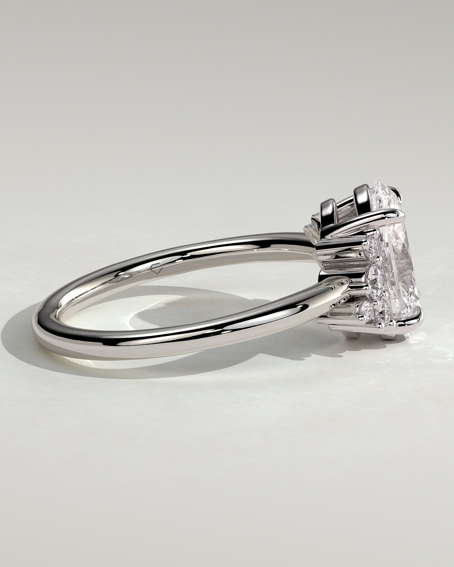 Esther - Oval Claw Solitaire with Clustered Round Opposing Shoulder Stones Engagement Ring - Platinum - White Gold / Platinum 2ct