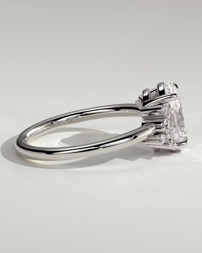 Esther - Oval Claw Solitaire with Clustered Round Opposing Shoulder Stones Engagement Ring - White Gold