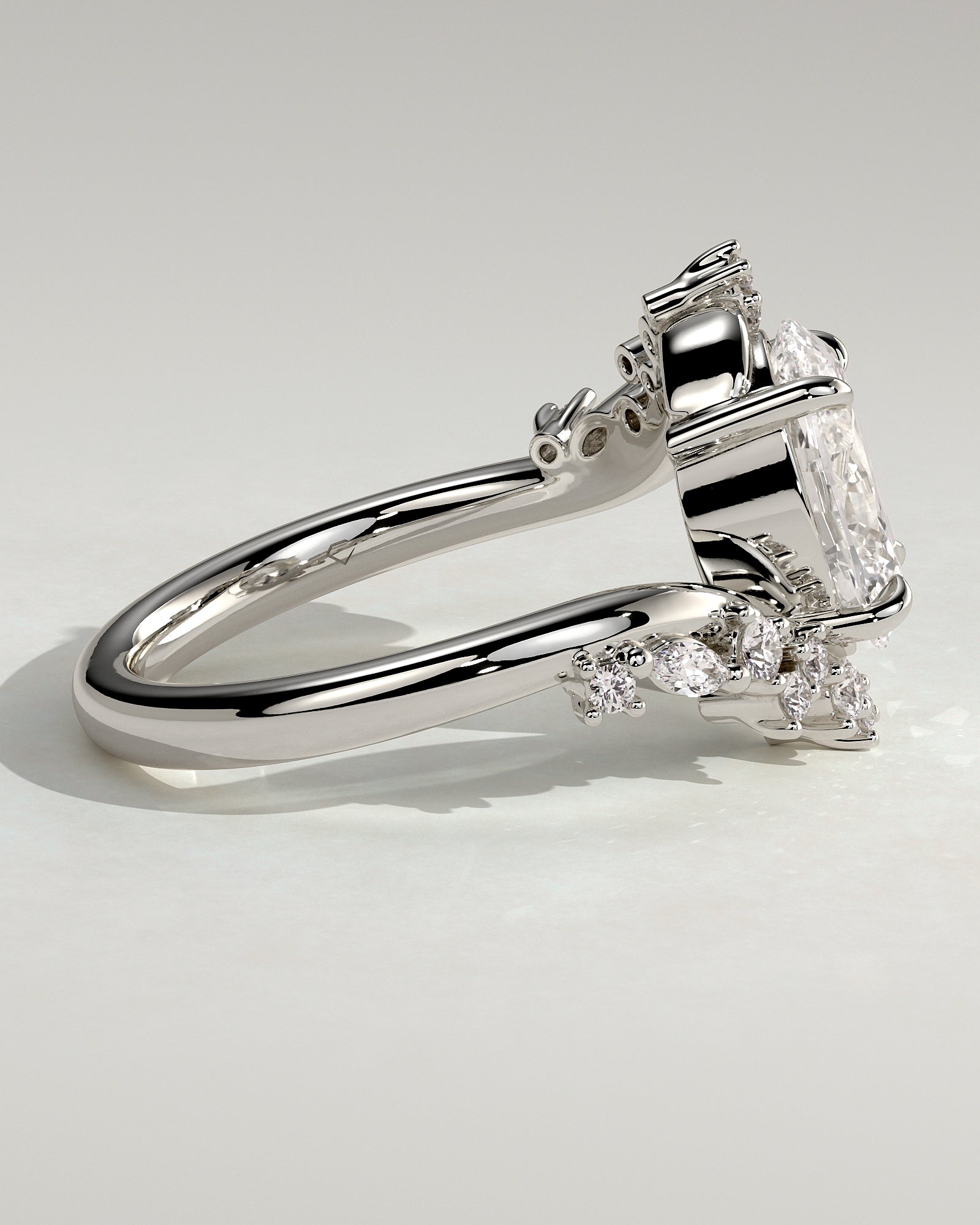 Ezmerelda - Oval Claw Solitaire with Bypass Band and Clustered Round-Marquise Accent Stones Engagement Ring - Platinum - White Gold / Platinum 2ct