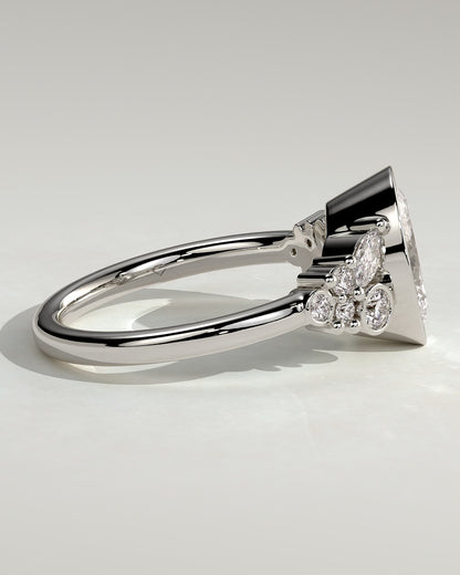 Isabella - Oval Bezel Solitaire with Clustered Round-Marquise Mixed Set Shoulder Stones Engagement Ring - Platinum
