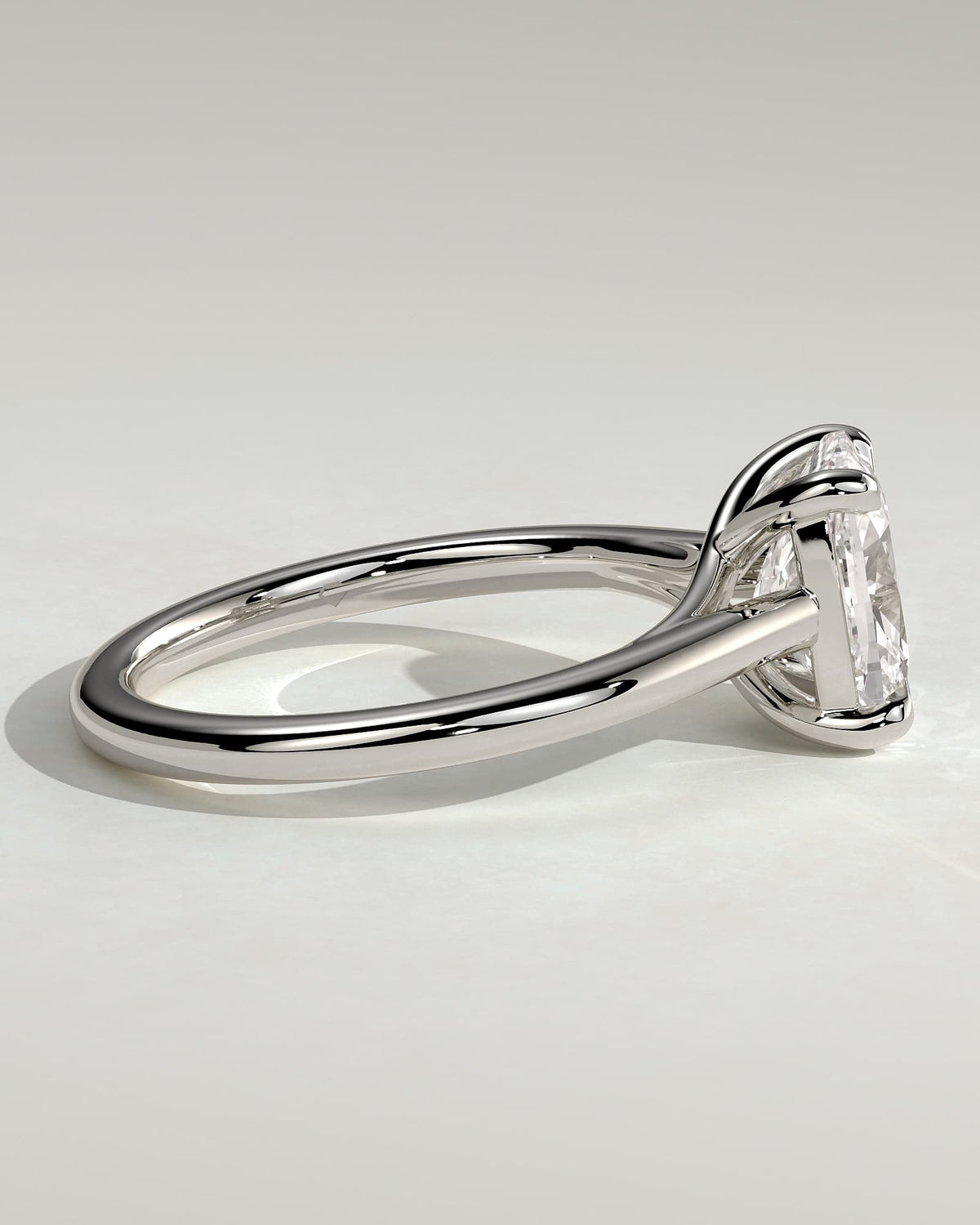 Kelsey - Elongated Cushion Claw Solitaire with Cathedral Low Setting and Open Trellis Gallery Engagement Ring - Platinum
