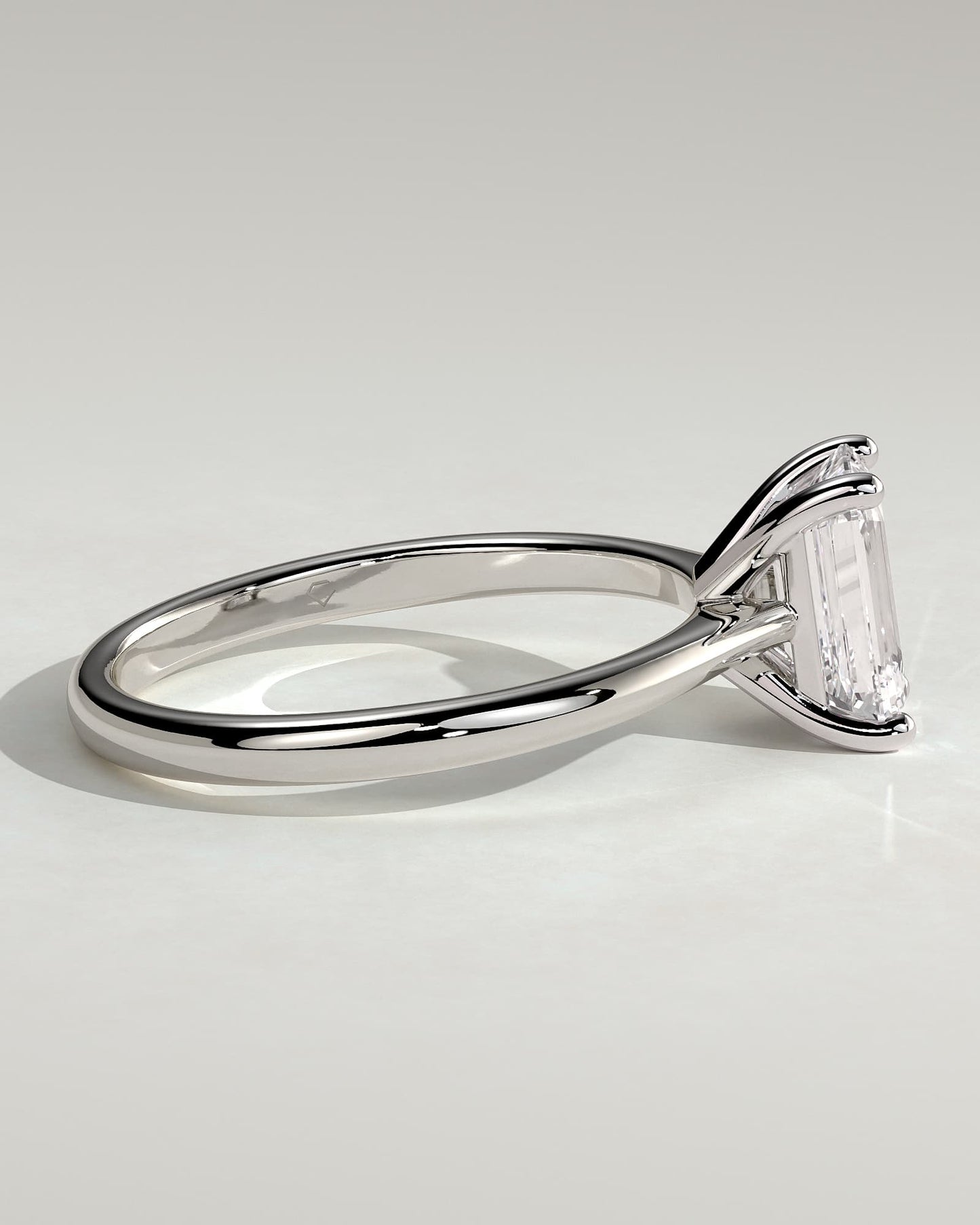 Freya - Emerald Claw Solitaire with Tapered Band and Cathedral Low Setting Engagement Ring - White Gold