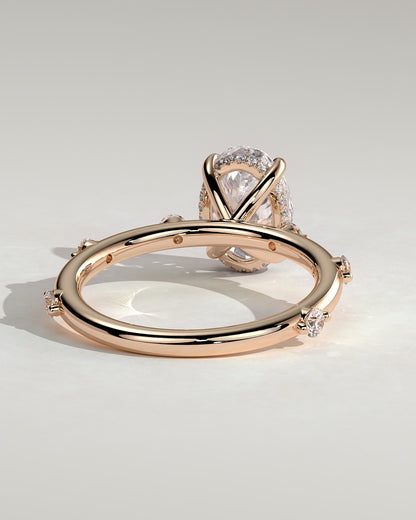 Elise - Oval Claw Solitaire with 6 Spaced Round Accent Stones and Hidden Halo Engagement Ring - Rose Gold