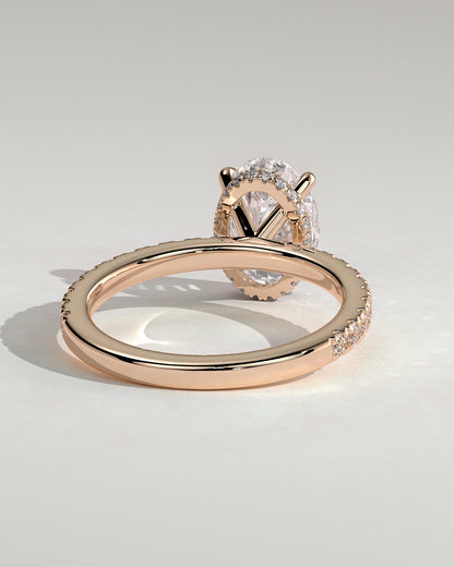 Evangeline - Oval Claw Solitaire with Wrap Around Hidden Halo and Pave Band Engagement Ring - Rose Gold