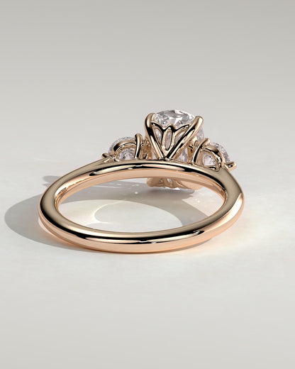 Charmaine - Elongated Cushion Claw Trilogy with Round Side Stones and Lily Detail Engagement Ring - Rose Gold