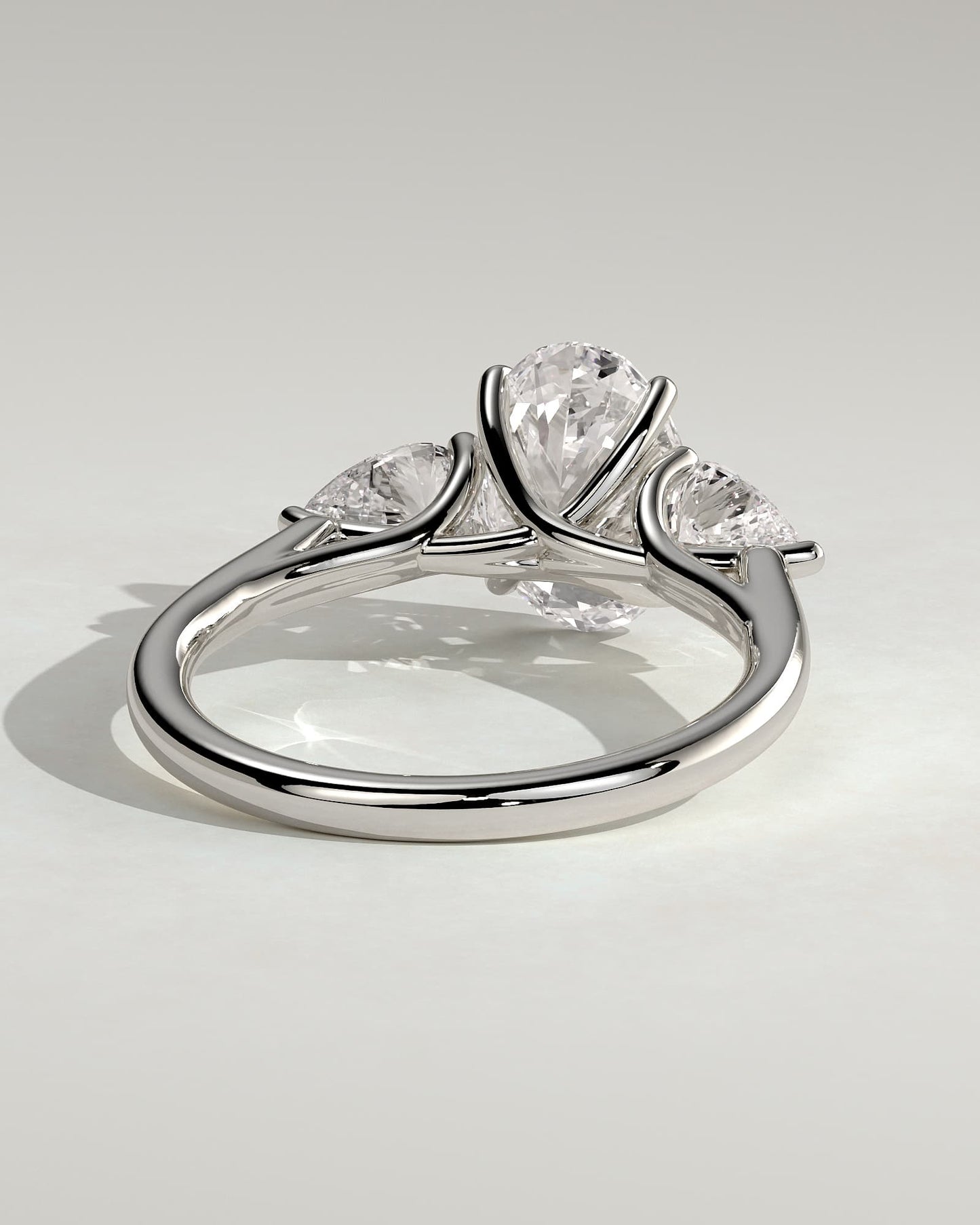 Amara - Oval Claw Trilogy with Pear Side Stones and Open Trellis Gallery Engagement Ring - White Gold - white gold - Lara Jewels