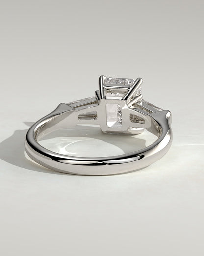 Bridget - Emerald Claw Trilogy with Tapered Baguette Side Stones and Cathedral Setting Engagement Ring - Platinum