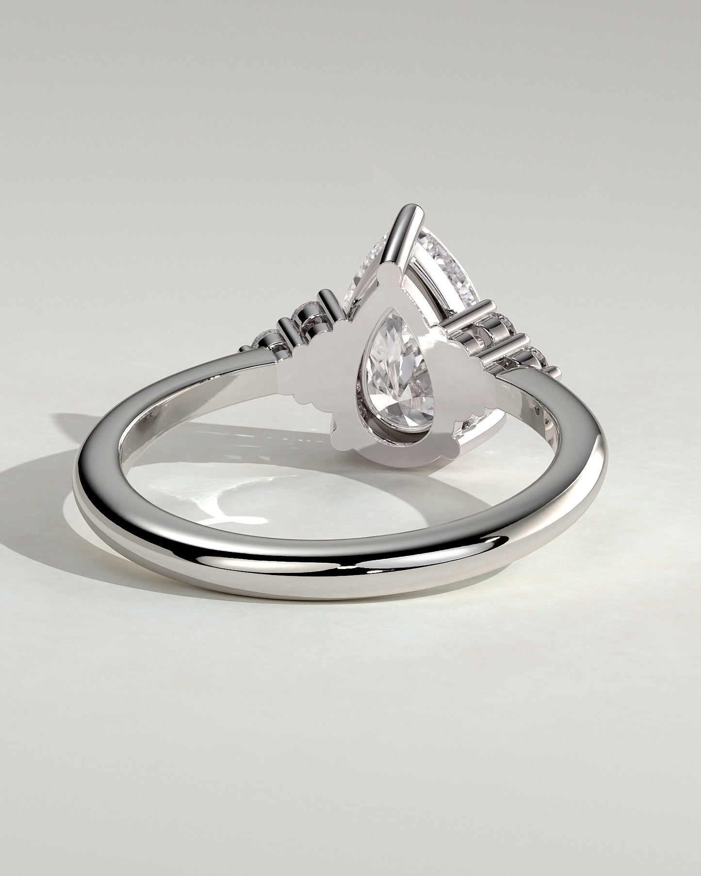 Brooke - Pear Claw Solitaire with Round Shoulder Stones Engagement Ring - Platinum - White Gold / Platinum 2ct
