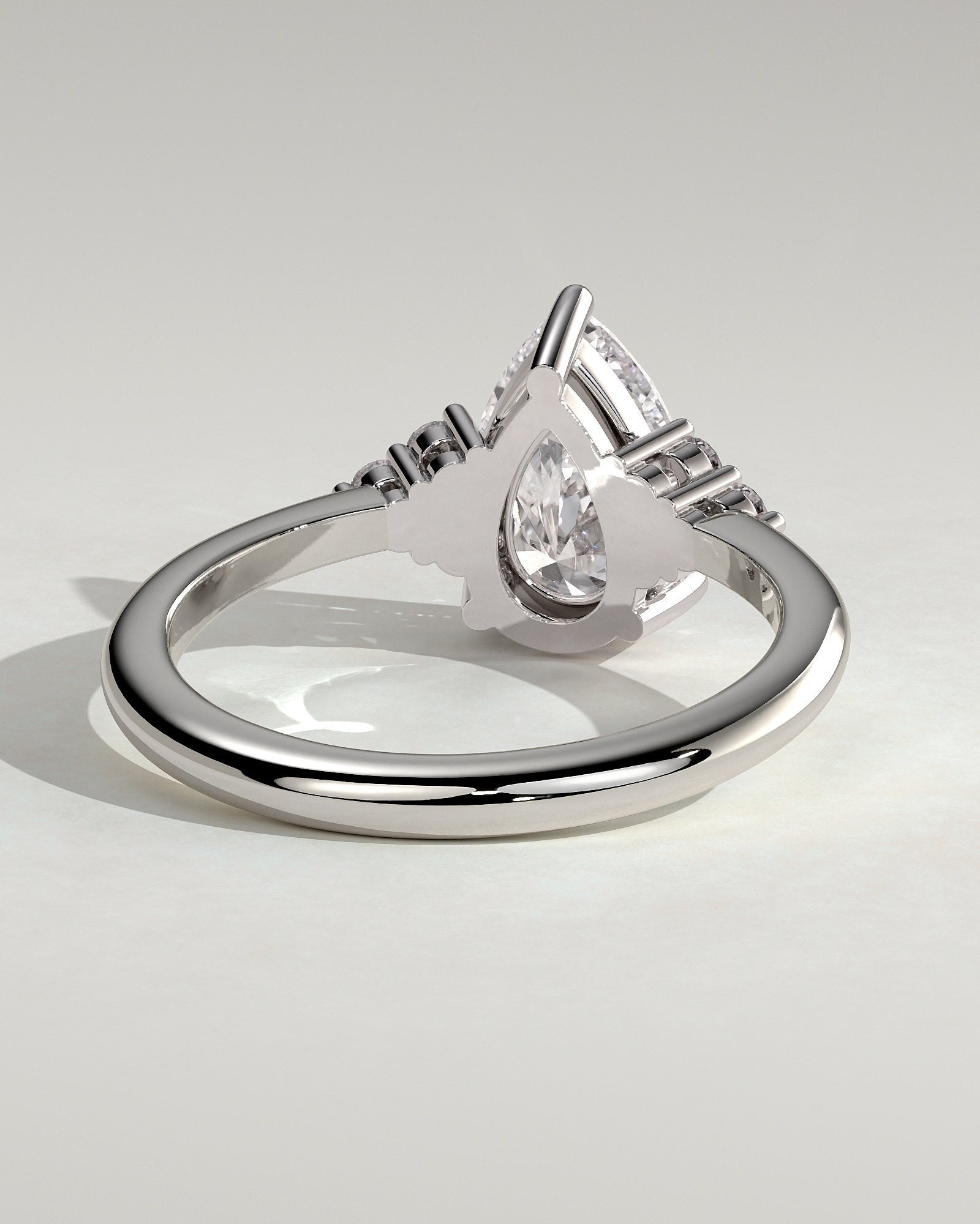 Brooke - Pear Claw Solitaire with Round Shoulder Stones Engagement Ring - Platinum - White Gold / Platinum 2ct