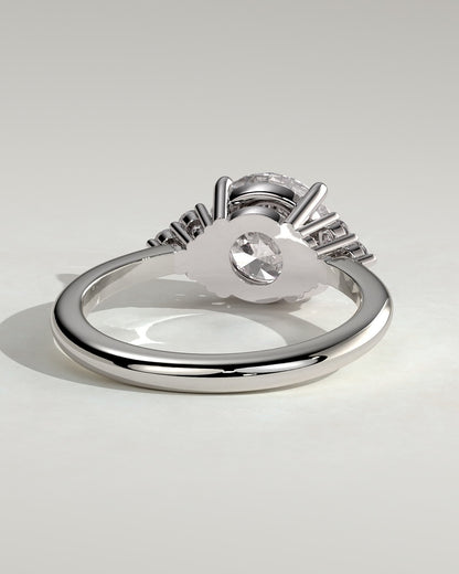 Greta - Round Claw Solitaire with Round Shoulder Stones Engagement Ring - Platinum