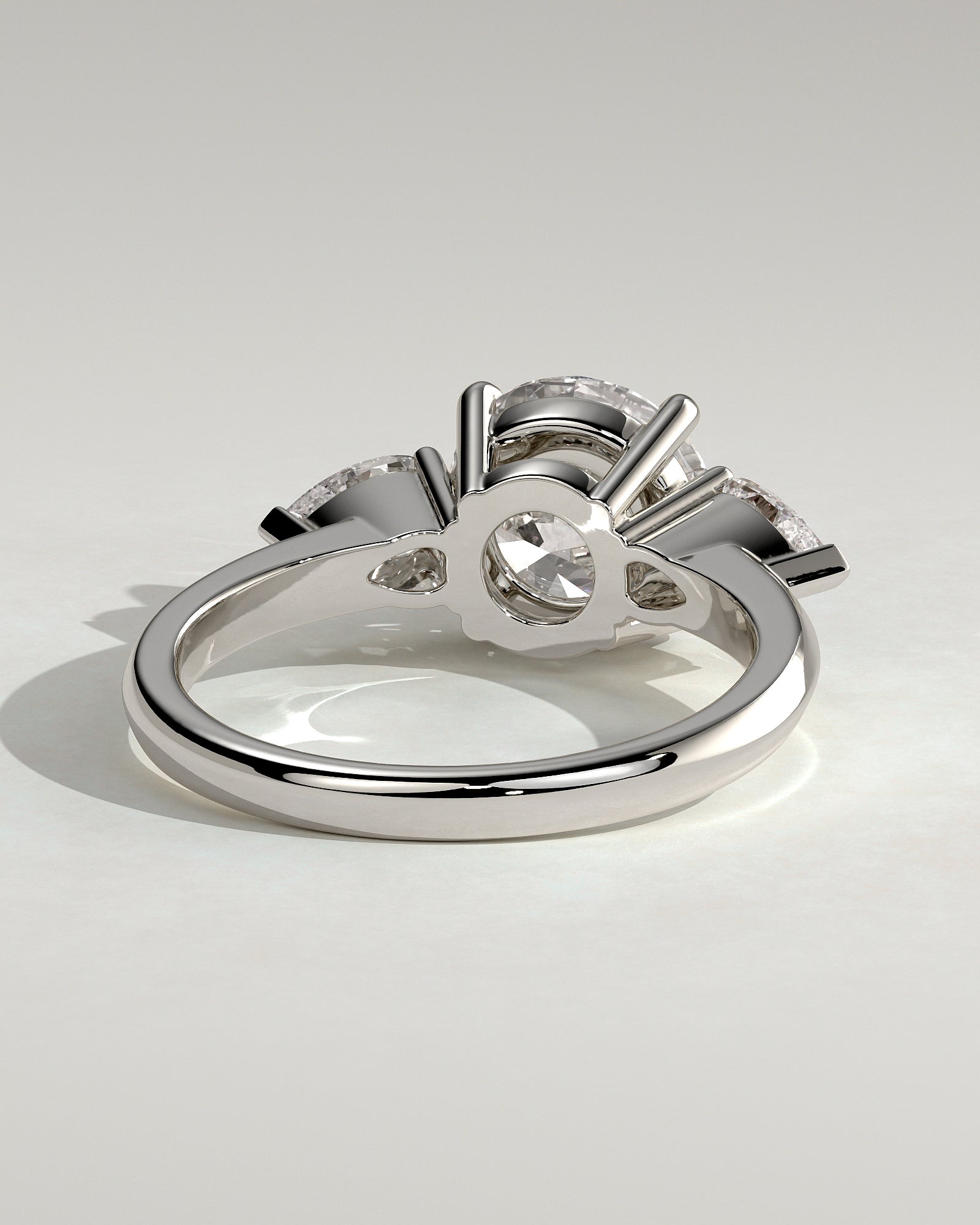 Halle - Round Claw Trilogy with Pear Side Stones and Knife Edge Band Engagement Ring - Platinum - White Gold / Platinum 2ct