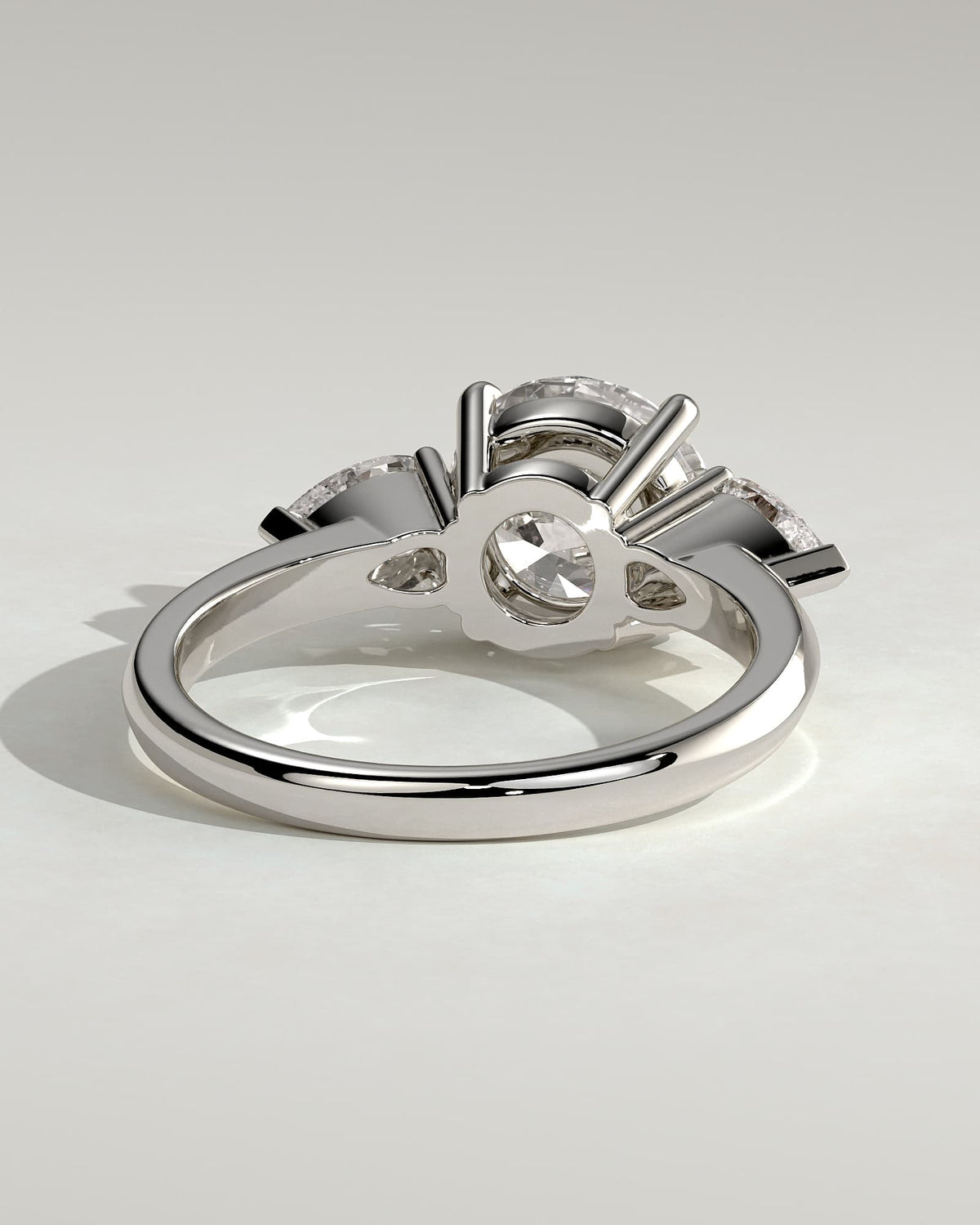 Halle - Round Claw Trilogy with Pear Side Stones and Knife Edge Band Engagement Ring - White Gold