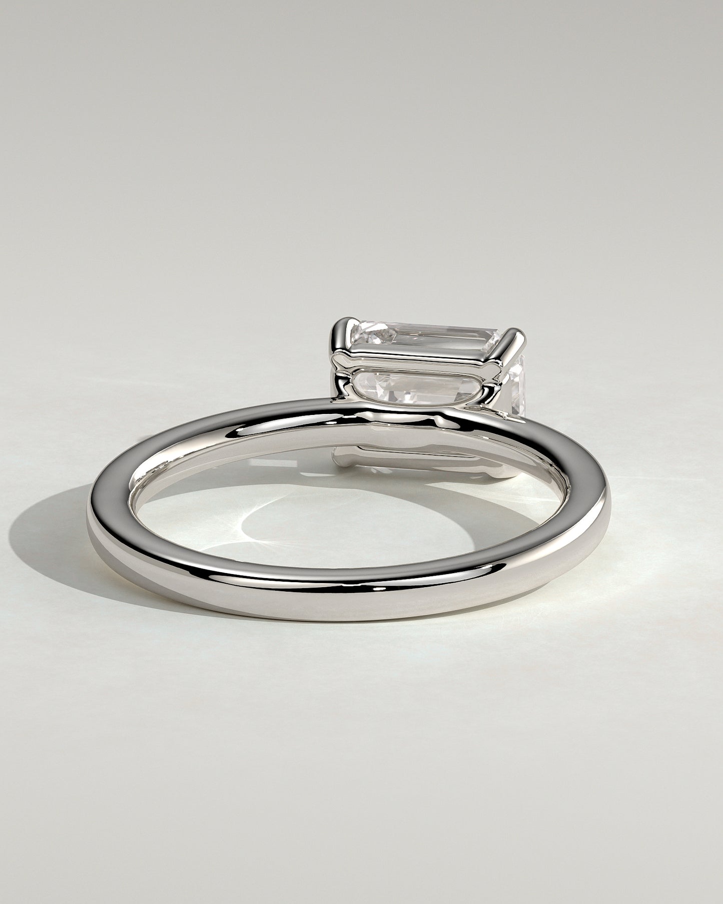 Evelyn - Emerald East West Claw Solitaire with Raised Basket Gallery Engagement Ring - Platinum - White Gold / Platinum 2ct