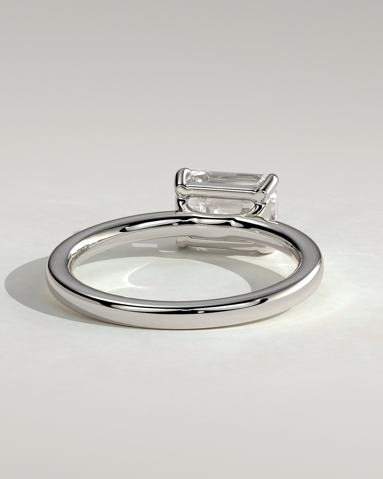 Evelyn - Emerald East West Claw Solitaire with Raised Basket Gallery Engagement Ring - Platinum - White Gold / Platinum 2ct