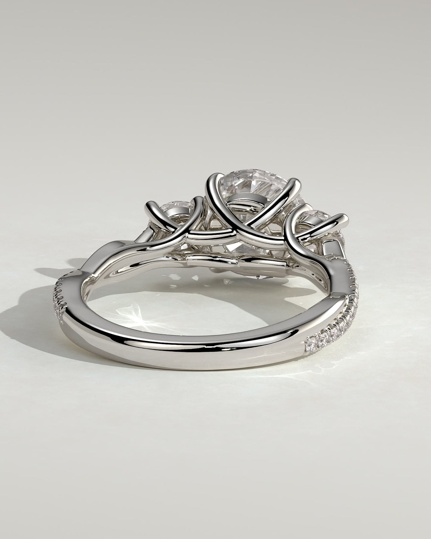 Jaylene - Round Claw Trilogy with Round Side Stones, Twisted Pave Band and Trellis Gallery Engagement Ring - White Gold