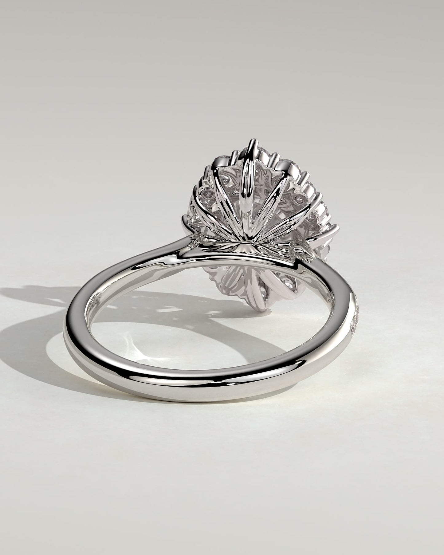 Jessica - Round Claw Solitaire with Graduating Halo and Bead Set Micropave and Tapered Band Engagement Ring - White Gold