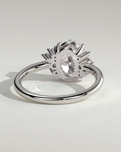Esther - Oval Claw Solitaire with Clustered Round Opposing Shoulder Stones Engagement Ring - Platinum