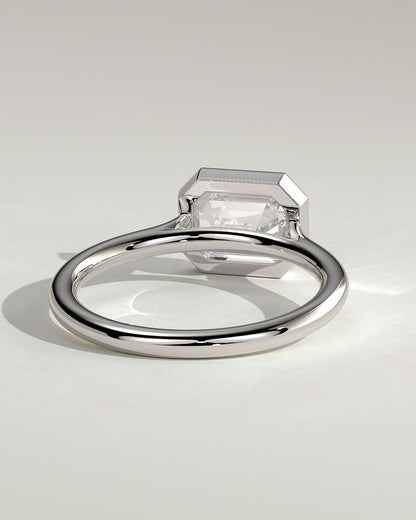 Olive - Statement Emerald East West Bezel Solitaire with Open Cathedral High Setting Engagement Ring - White Gold